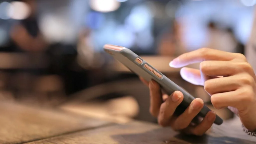 person buying with phone